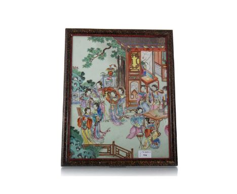 CHINESE FAMILLE ROSE PORCELAIN PANEL, LATE 19TH CENTURY decorated with female figures in a garden setting, on a light celadon