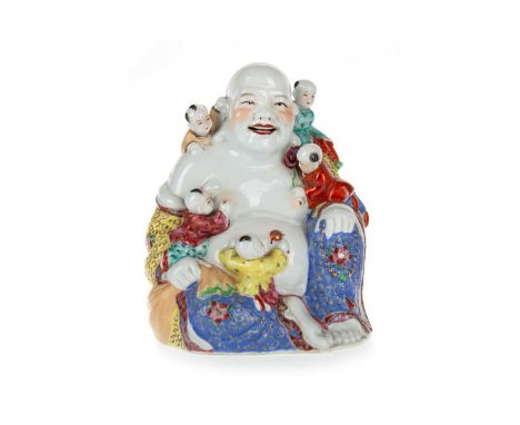 CHINESE POLYCHROME BUDDHA, 20TH CENTURY the buddha modelled with climbing children24.5cm highVery light crazing and surface s