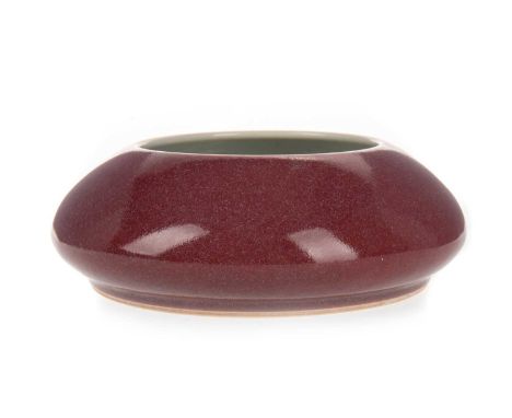 CHINESE PEACH BLOOM GLAZED PORCELAIN BRUSH WASHER, 20TH CENTURY of circular form, Kangxi mark to base though 20th century14cm