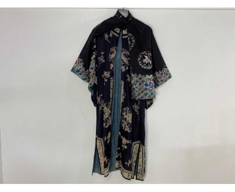 CHINESE SILK EMBROIDERED ROBE, EARLY 20TH CENTURY  embroidered with cranes, flowers and waves on a dark ground, along with a 