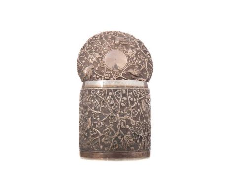 CHINESE EXPORT WHITE METAL JAR AND COVER, LATE 19TH / EARLY 20TH CENTURY repousse decorated with birds amongst flowering prun