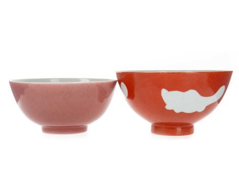 CHINESE ORANGE GLAZED BOWL, AND A CHINESE PINK GLAZE BOWL the orange glaze bowl bearing Qianlong character mark to base thoug