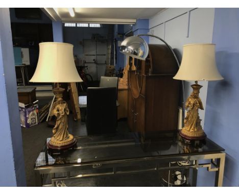 A pair of gilt decorative 'Angelic' table lamps