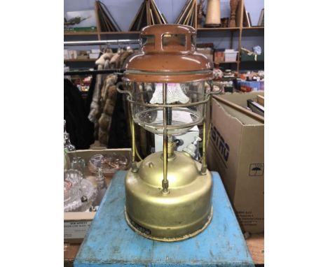 A boxed Tilley lamp