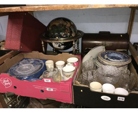 Shelf of assorted including a globe