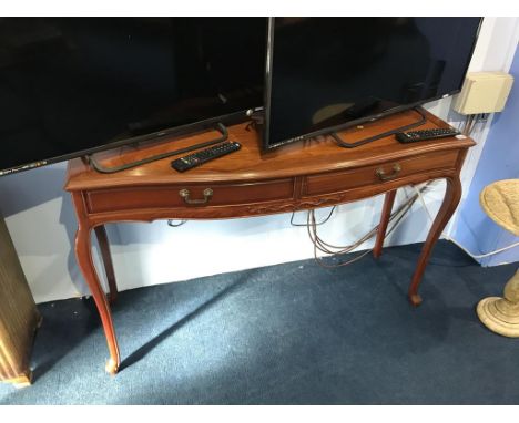 An oriental two drawer side table