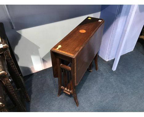 An Edwardian mahogany Sutherland table