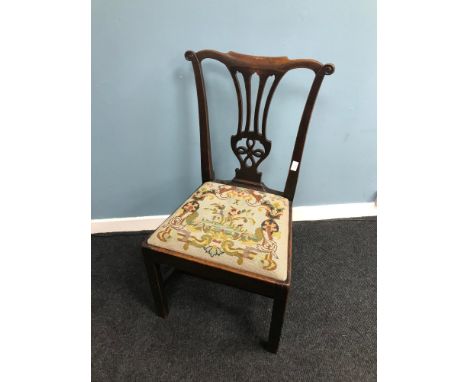 A Georgian Chippendale boardroom chair. Styled with tapestry topped cushion 