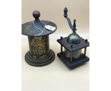 An oriental detailed cigarette dispenser &amp; pepper grinder. 