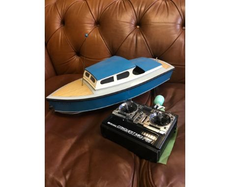 A Hand made boat model, With built in motor, comes with remote control. Used in competitions. made by Robert Henry Walker (19