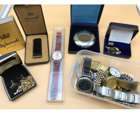 A Collection of various named Watches which includes Sekonda, Swatch watch with original case, Grants of Dalvey clock, and si