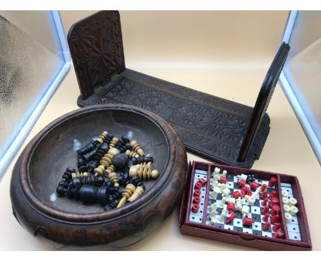 An arts &amp; crafts carved extending book shelf, solid wood fruit bowl inlaid with brass, a lot of hand turned ebony and box