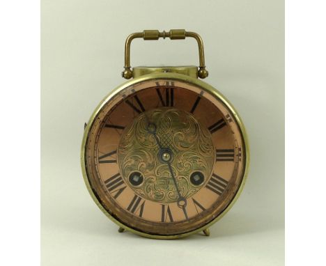 A Trench Art mantle clock of cylindrical form, the brass casing fitted with a clock with engraved copper dial with Roman nume