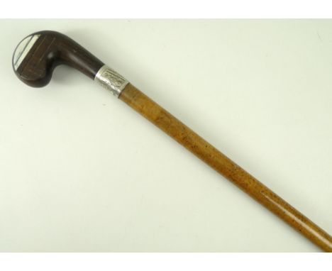 A snake wood Sunday stick, with white metal collar and hardwood carved golf club handle, 89cm.