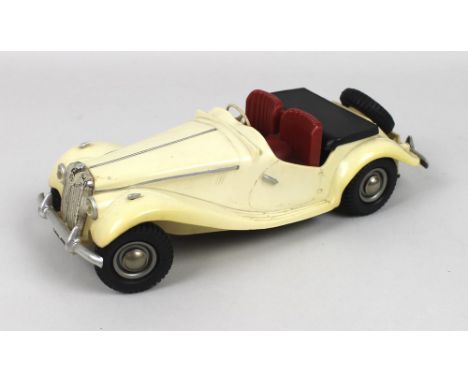 A 1950's Victory Industries Ltd, V Models battery operated MG TF scale model racing car in cream, complete with original box 