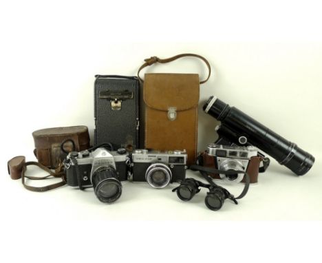 A group of vintage cameras and optical items comprising an Ilford Advocate white die cast camera with Dallmeyer lens, a pair 