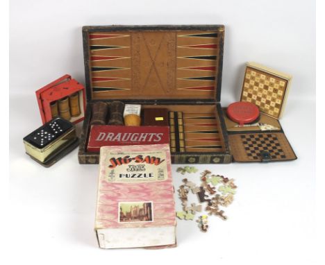 A collection of games including a two hundred piece Great Western Railway jigsaw puzzle by Chad Valley Co, a folding Backgamm