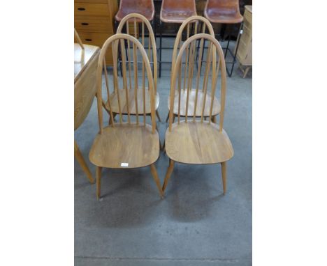 A set of four Ercol Blonde elm and beech Quaker chairs 