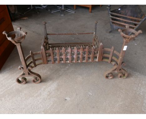 A Victorian Gothic Revival cast iron fire grate 