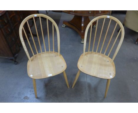 A pair of Ercol Blonde ash Windsor chairs 