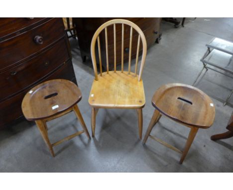 An Ercol Blonde elm and beech Windsor chair and a pair of beech stools 