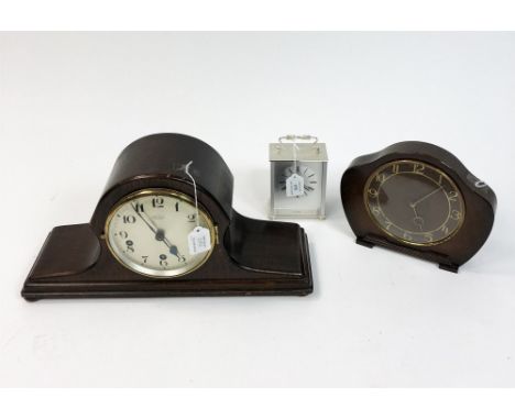 Two early 20th Century mantel clocks The first of 'Napoleon hat' form by Henry Wells of Shrewsbury, the silvered dial with Ar