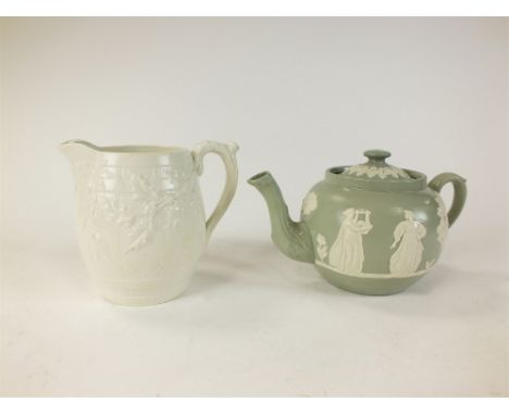 A collection of Victorian relief-moulded jugs together with similar teapot and coffee pot and cover, late 19th century, inclu