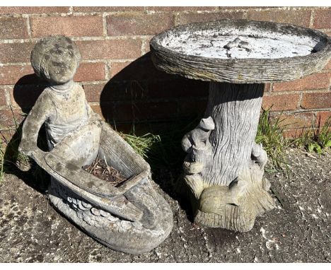 A large modern garden bird bath modelled as squirrels on a tree trunk together with a garden planter modelled as a boy pushin