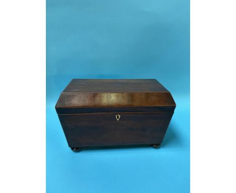 A 19th century mahogany tea caddy, 31cm wide