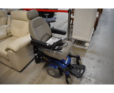 A pride mobility scooter, sold as seen, from house clearance