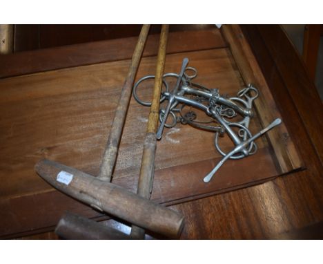 Two vintage polo mallets , horse bits etc