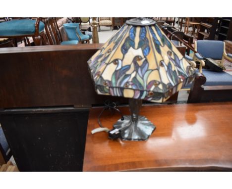 A tiffany style leaded light side or table lamp