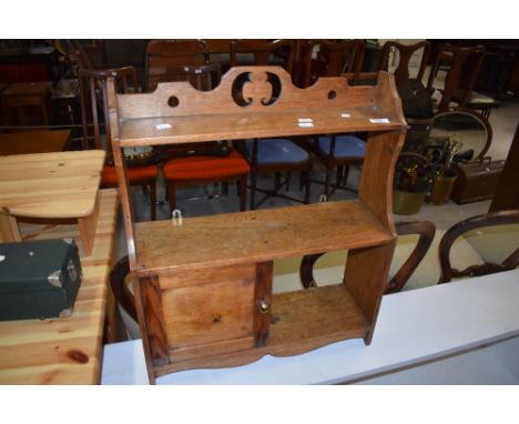 A Victorian oak wall shelf, width approx. 52cm