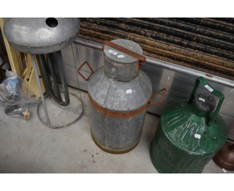 A vintage galvanised milk churn