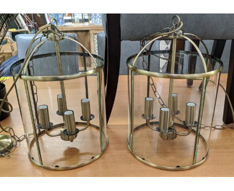 HALL LANTERNS, a pair, gilt metal and glazed, each with four branch light, 200cm drop each. (2) 