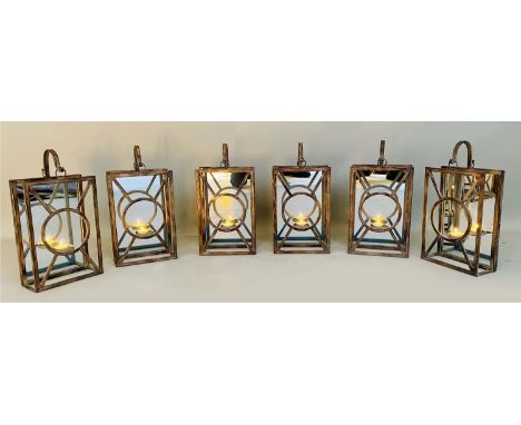 WALL HANGING CANDLE LANTERNS, a set of six, Art Deco style, mirrored backs, 43cm x 22cm x 11cm. (6) 