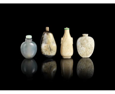 A group of four jade and hardstone snuff bottlesQing Dynasty/Republic periodIncluding: a well-hollowed creamy and black jade 