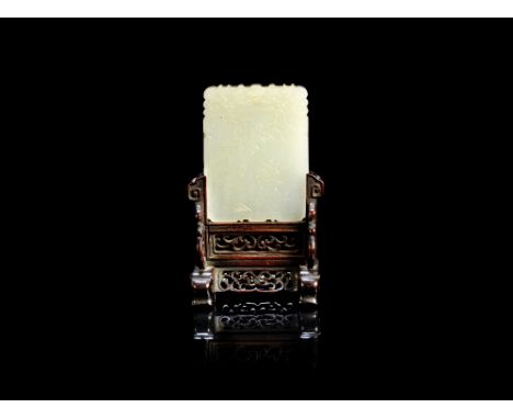 A carved white jade plaque19th centuryDepicting an equestrian hunter riding along a rocky path before a pavilion, beneath a c