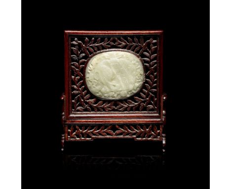 A jade 'chilong' belt buckle and a plaque18th/19th centuryThe buckle carved in openwork relief with a typical striding chilon