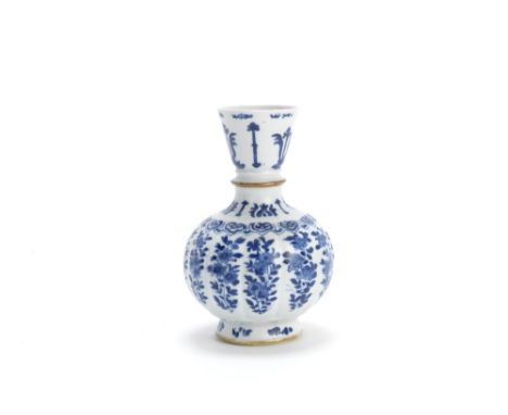 A blue and white huqqa baseKangxiThe body of lobed form decorated with leafy fruit and flower sprays, rising to a flaring cup