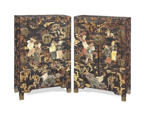 A pair of inlaid lacquer cabinetsLate Qing DynastyThe black lacquer painted with gilt and red bats among clouds, the front in