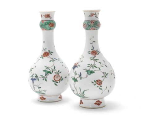 A Pair of Famille Verte Bottle VasesKangxiThe gently flaring necks with bulbous 'prunus and cracked ice' mid-sections, the bo