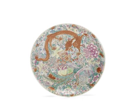 A large famille rose 'mille-fleurs' chargerQianlong seal mark, Late Qing Dynasty/Republic PeriodBoldly enamelled with a confr