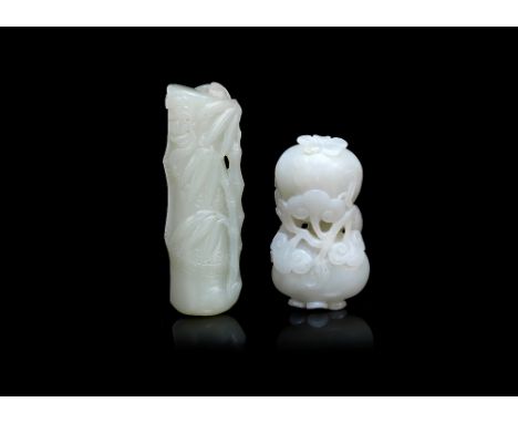 A pale jade carving of pomegranate and a pale green jade carving of bamboo19th/20th centuryThe first from a stone of whitish 