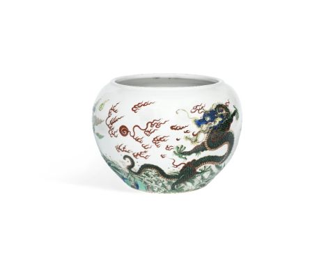 A large famille verte 'dragon' fish bowlGuangxuThe deep vessel of alms bowl form, vibrantly enamelled to the exterior with tw