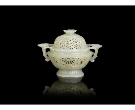 A reticulated green jade 'lotus' incense burner18th/19th centuryThe globular body and domed lid all pierced and carved with a