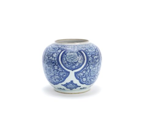 A large blue and white jarKangxi Painted with shaped pendant lappets reserved with large peony blooms and scrolling foliage.3