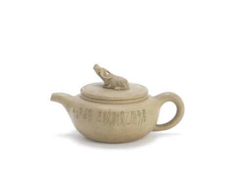 A Yixing 'water buffalo' teapot and coverQing DynastyOf compressed rounded form with recumbent water buffalo finial, incised 