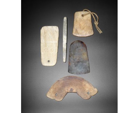 A group of five archaic jade bladesProbably Western Zhou Dynasty and later&nbsp;Comprising: a spinach jade axe blade with gen