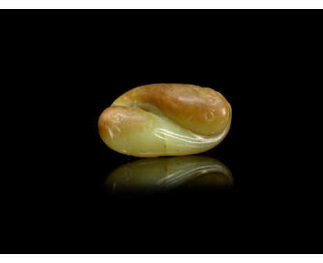 A yellow and russet jade 'double catfish' groupSong/Ming DynastyEach fish modelled head to tail, adjacent to the other.5.5cm 